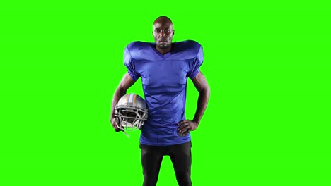 african american football player on green screen background.