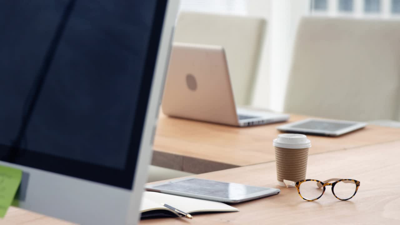 Scene load starting wireframe nodes fading above desk, data streams forming charts and analytic map