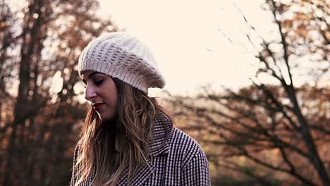 Close-up-of-a-Caucasian-woman-in-an-autumnal-dress-looking-around