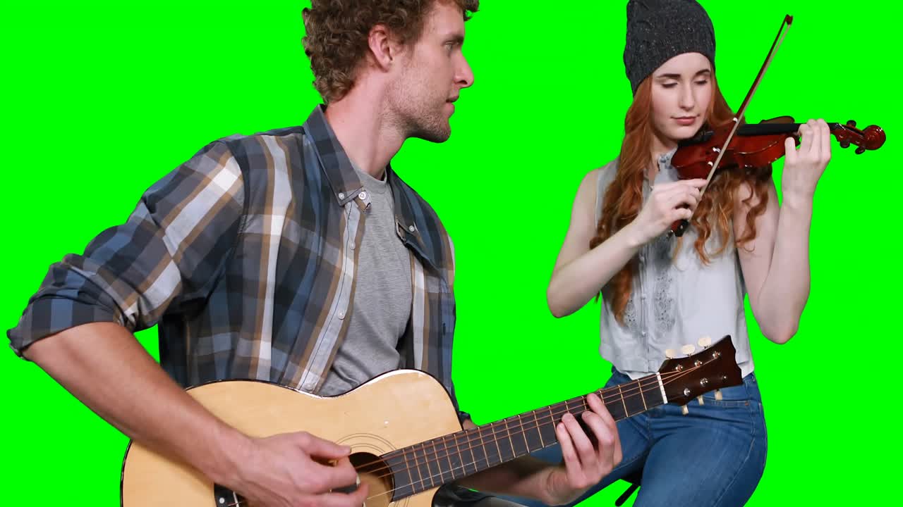 기타 와 바이올린 을 연주 하는 음악가