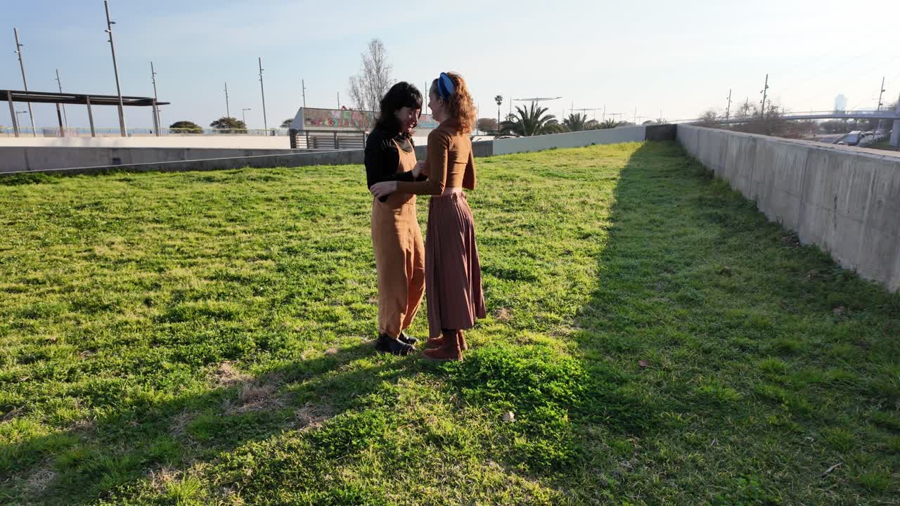 Two women friends in a park