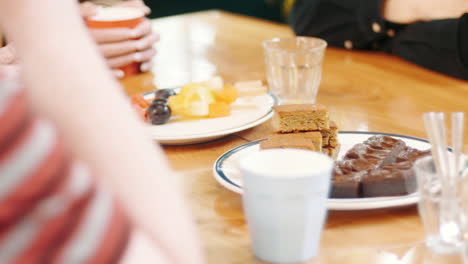 delicious snacks on a wooden table during a lunch break at the office