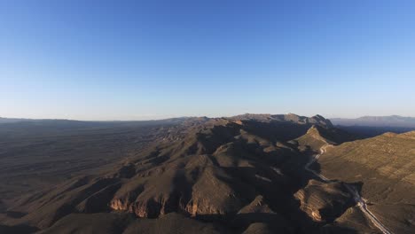 Aerial-shot-of-the-mountains-of-the-National-Park-of-Peguin-in-Chihuahua-at-sunset