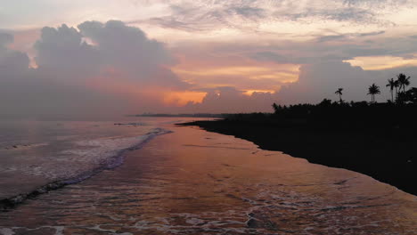 Beautiful-footage-of-a-atmospheric-sunset-at-the-beach,-shot-in-Bali,-Indonesia