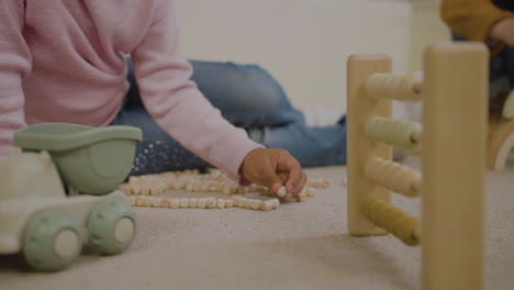 Little-girl-on-the-floor-of-the-playroom