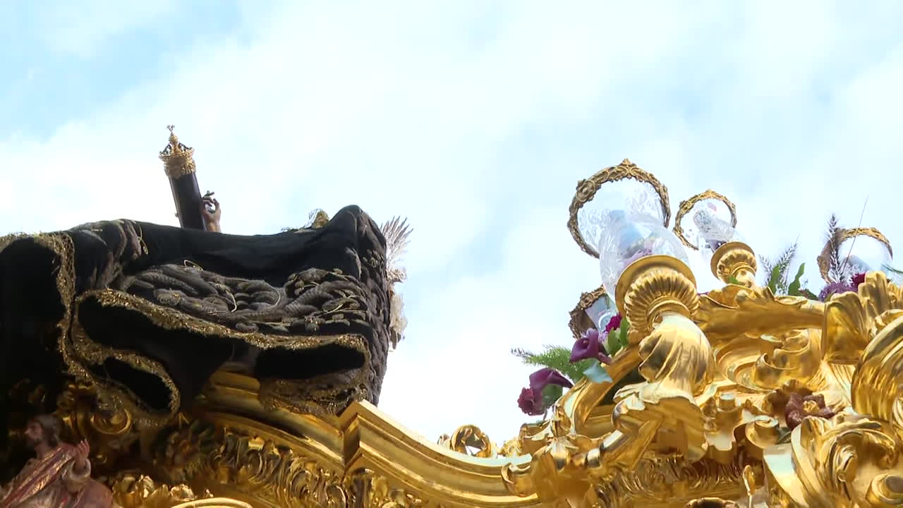 Religious Procession with Golden Carriages and Black Cloths