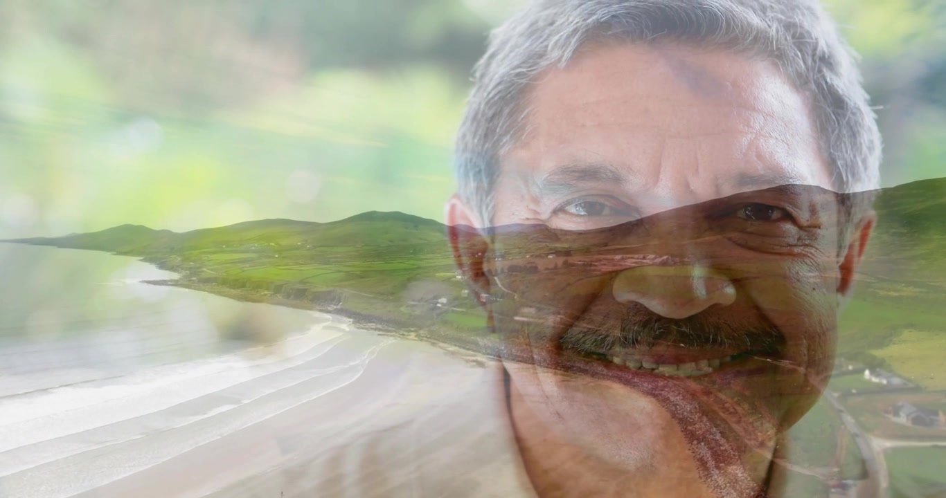 Senior man smiling while coastline dissolving and overlaying lower face, supporting health branding