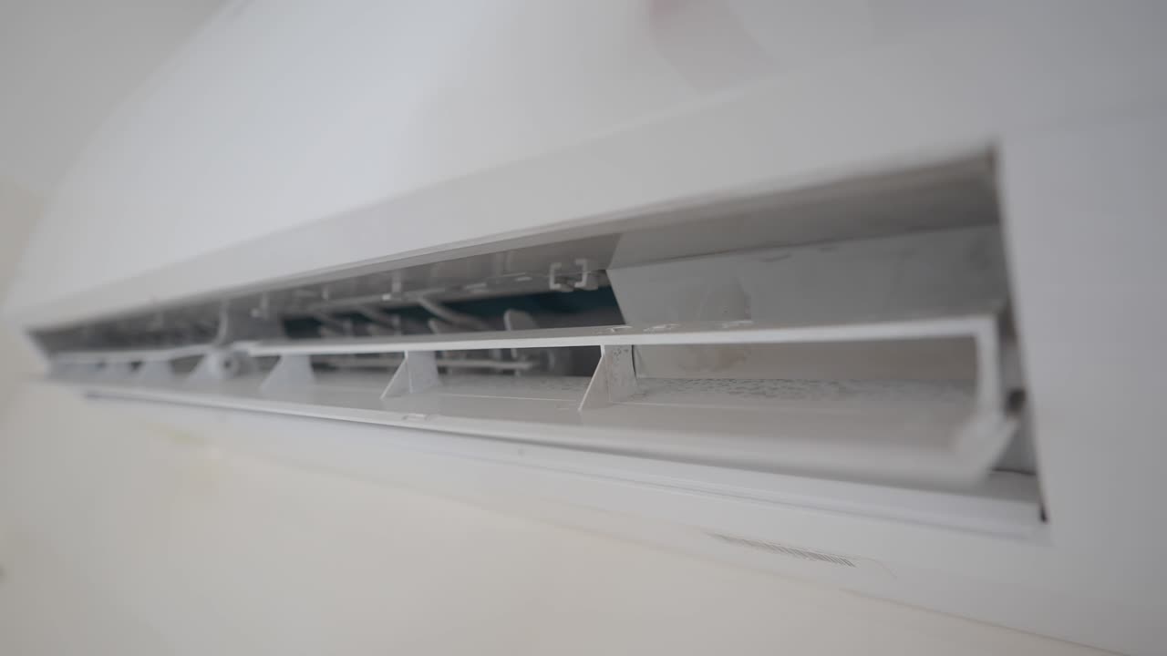 Premium stock video A closeup of a white wallmounted air