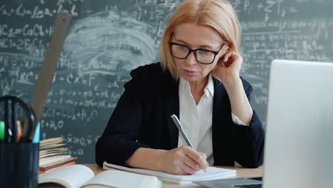 teacher working in a classroom