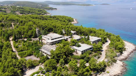 Aerial-drone-shot-of-an-old-hotel-in-Jelsa-on-the-island-of-Hvar,-Croatia