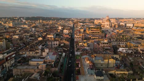 forward drone shot above via condotti, famous street leading to the spanish steps in rome, italy