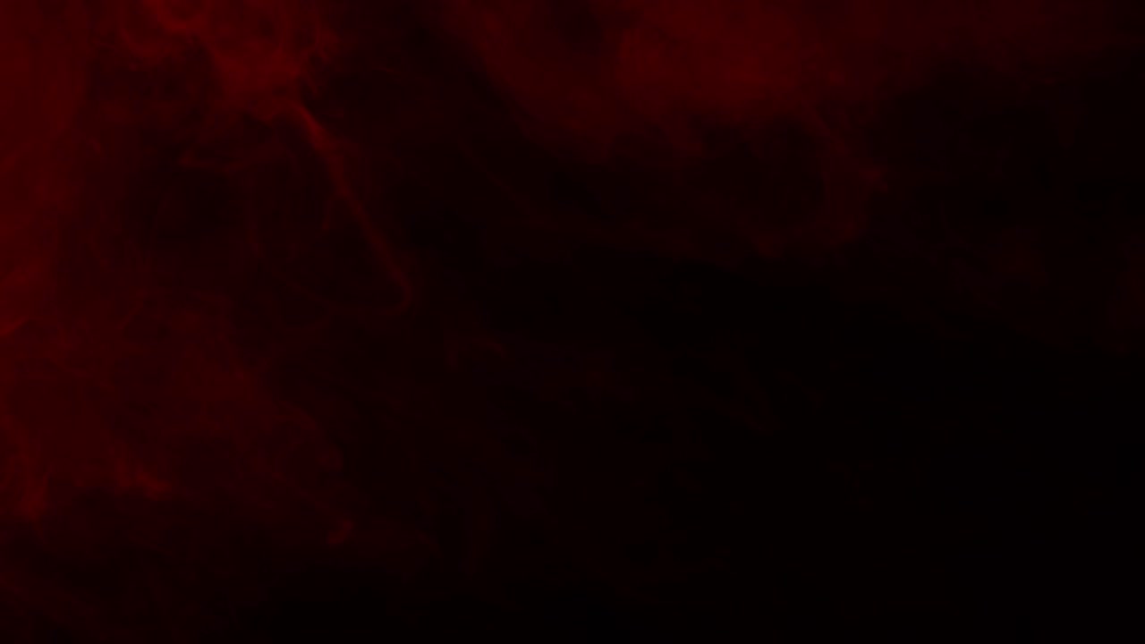 Slow moving dark red clouds or smoke swirl to create a moody and atmospheric texture, abstract background for horror or dramatic projects