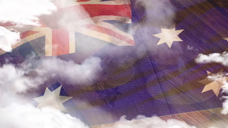 animación de nubes que se mueven sobre la bandera de australia, madera, luz solar y cielo azul