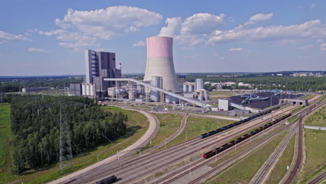 Aerial-view-of-Jaworzno-power-plant-next-to-railway,-Jaworzno,-Poland