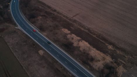 Beautiful-twisty-roads-going-through-agriculture-lands-at-the-sunset