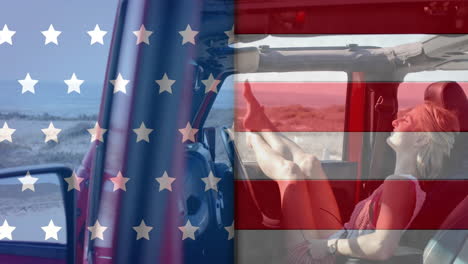 Animation-of-flag-of-usa-over-caucasian-woman-in-car-on-beach