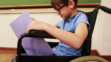 disabled pupil smiling at camera