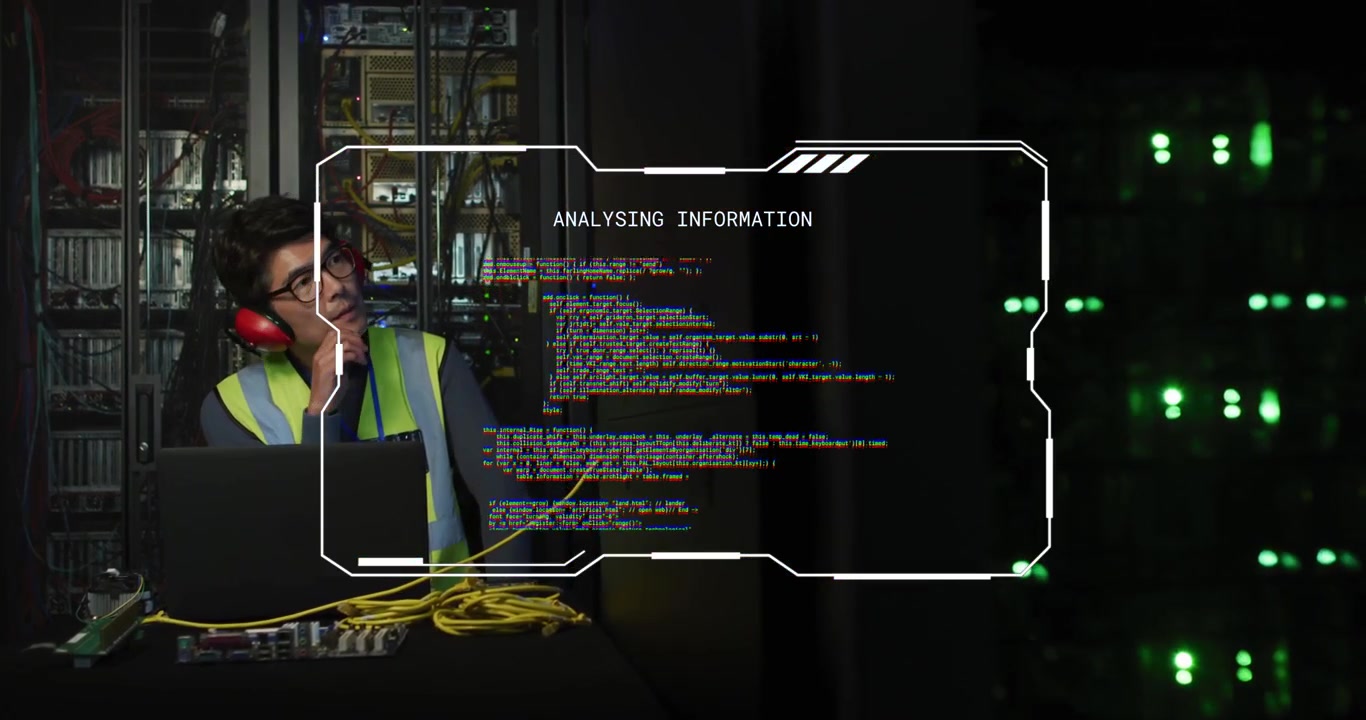 Vertical video: HUD appearing, tech in vest monitoring servers on laptop at DC, with yellow cables