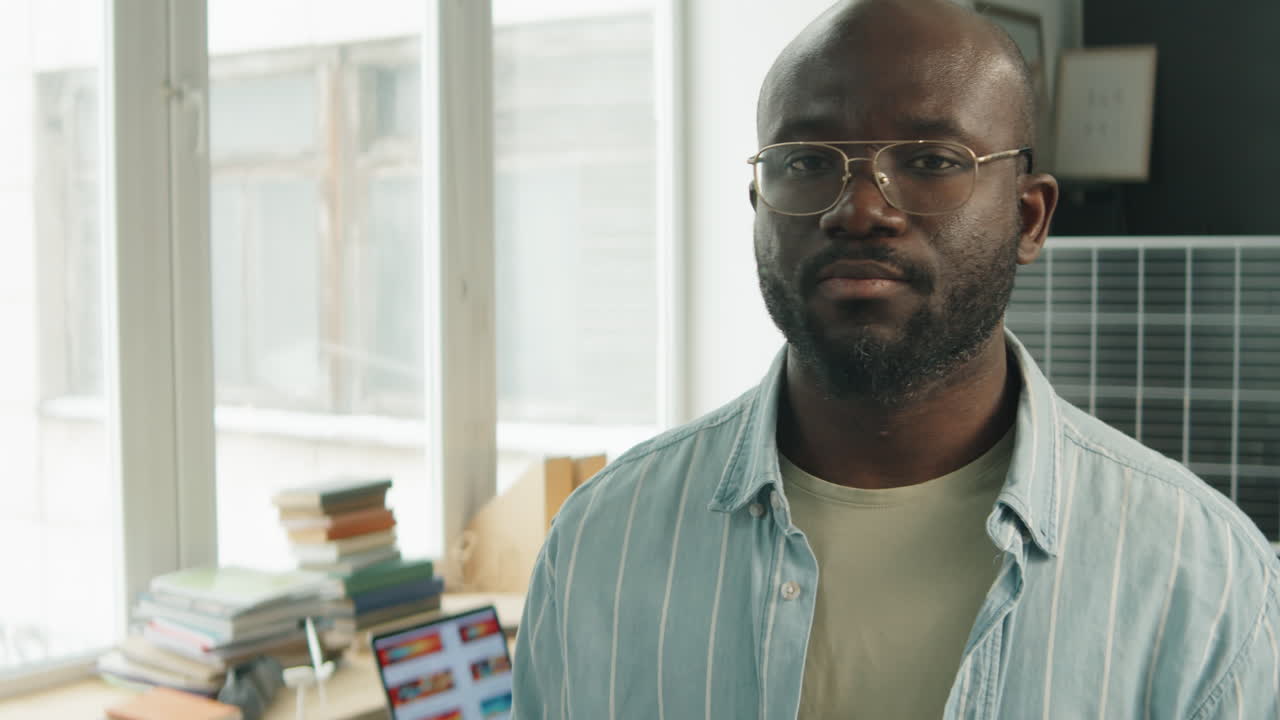 Portrait of African American Renewable Energy Engineer in Office
