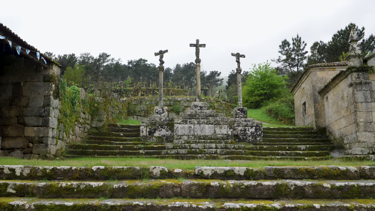 Ancient Religious Site with Chapel and Crosses