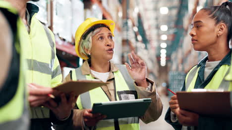 warehouse team discussing logistics