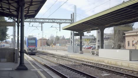 Fixed-Shot-Of-Train-Leaving-Railway-Station