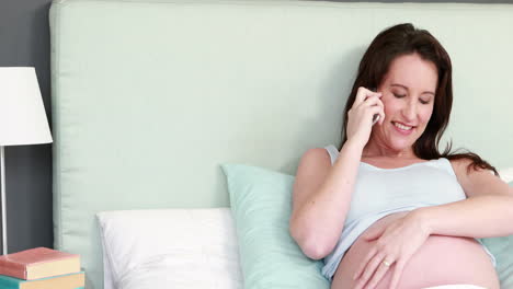 pregnant woman on phone call