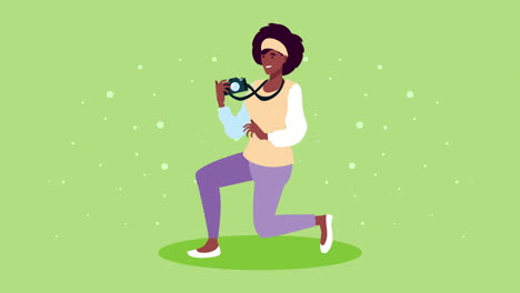 fotógrafa afro-femenina tomando una foto