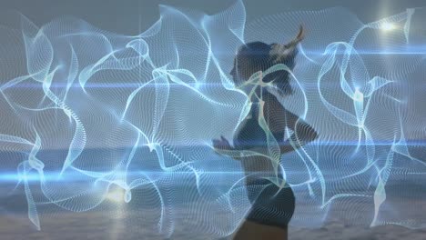 animation of blue shapes over caucasian woman running on beach