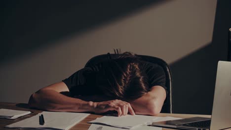 tired employee at desk