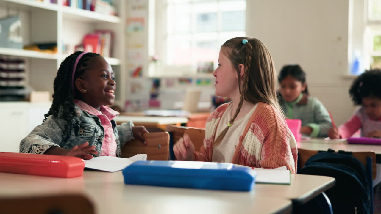 Students High-Fiving in a Classroom