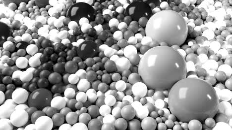 4к 3d looped animation with beautiful black and white small and large spheres or balls as an abstract geometric background. beautiful composition with a plane is covered black and white balls