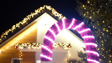 christmas house decorated with festive lights