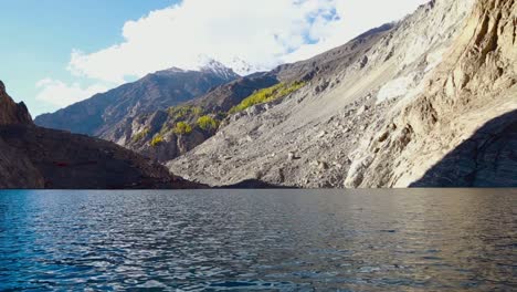 magnificent blue lake ringed by mountains capped with snow, the most spectacular mountain view with lake