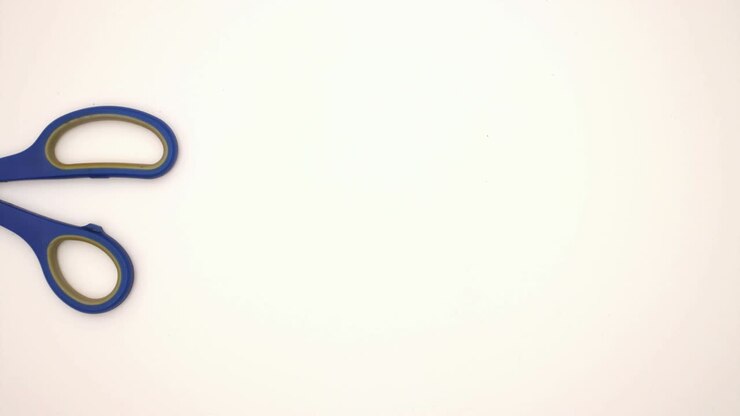 Scissors on white background - Stop motion animation