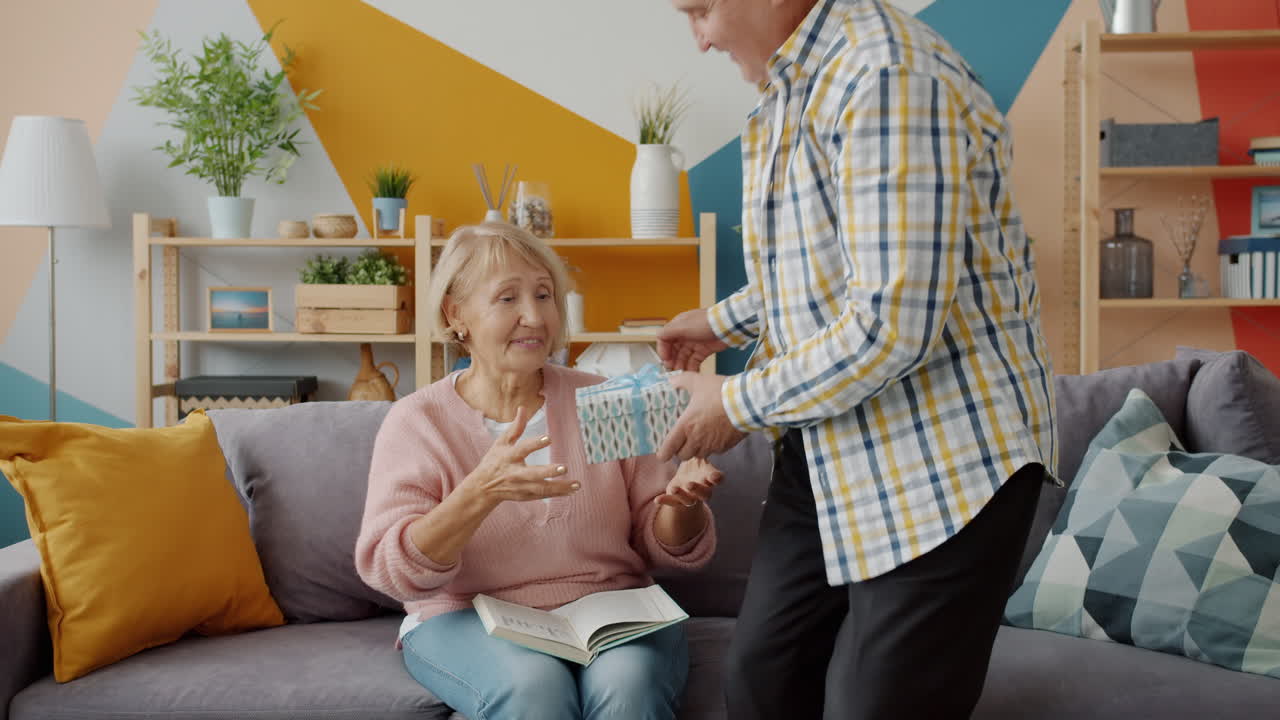 Senior Couple Giving Each Other a Gift