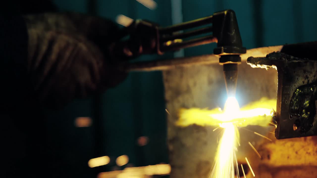 Welder welding a metal