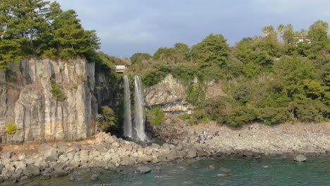 Jeongbang-waterfall-Jeju-Island-South-Korea-Drone-Aerial-View-in-4K