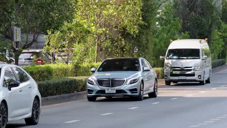 vehicles moving along a busy city road