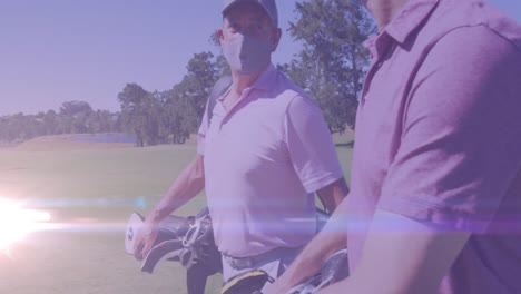 animation of light trails over caucasian male golf players on golf course