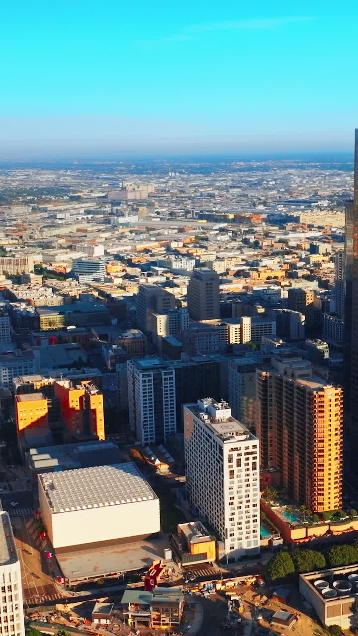 Outdoor american skyscrapers. City of Los-Angeles skyline scenic aerial view. Vertical video