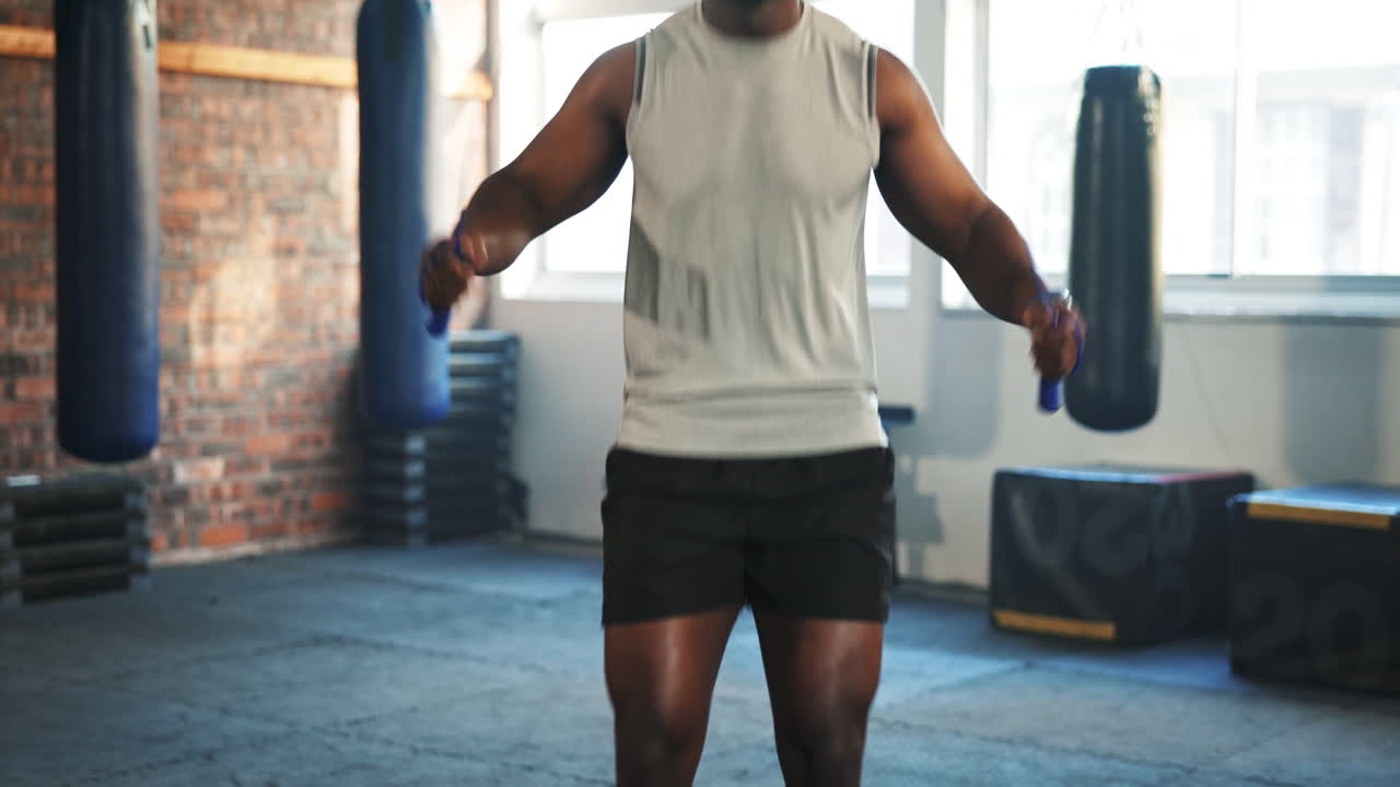 Man, fitness and body skipping rope in cardio