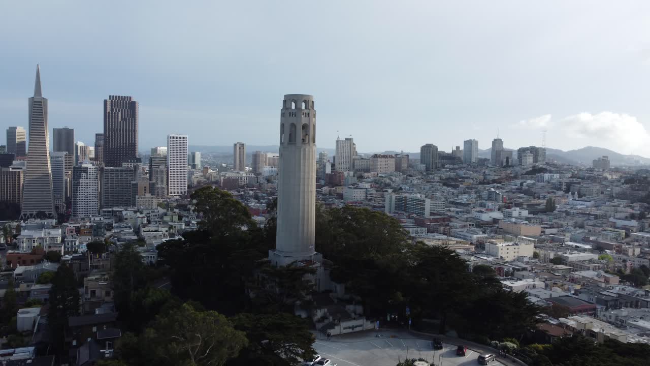 Spectacular Aerial Rotation Over Telegraph Hill, Coit Tower (A Historic Landmark) Overlooking The San Francisco Downtown City Skyline.