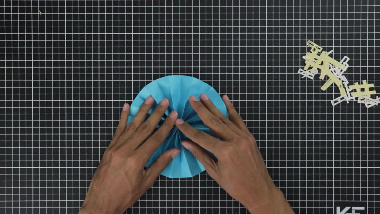 Making large circular rosette, homemade arts and crafts project