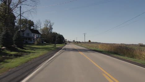 view from the driver to the road, driving through the countryside in the american outback