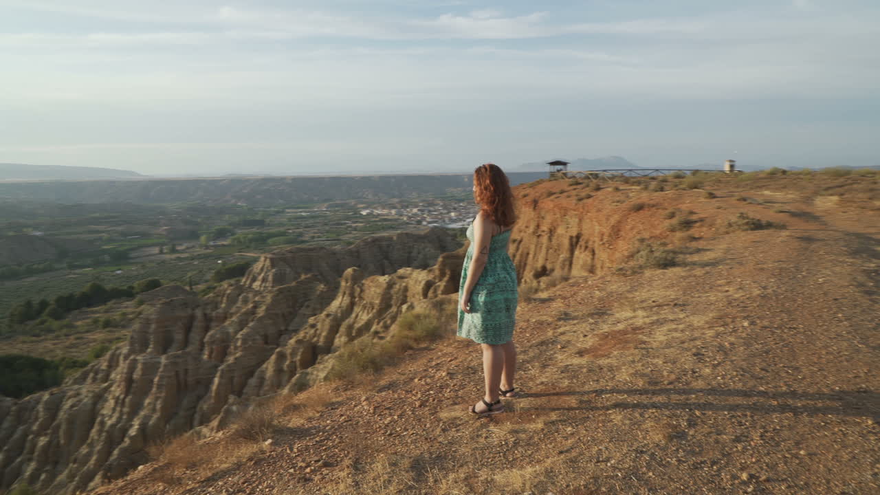 Woman enjoying the view of the mountains