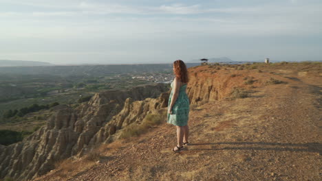 woman enjoying the view of the mountains