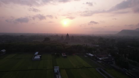 aerial view of sunset and silhouette of prambanan temple, a hindu temple in indonesia