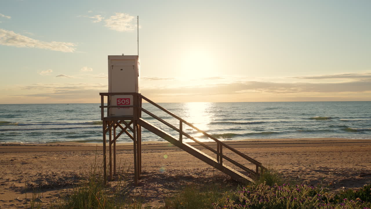 Lifeguard Tower on a Beach at Sunset
