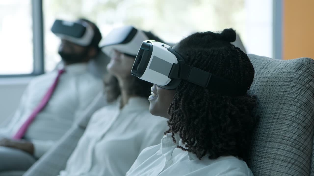 Cheerful business people in vr headsets